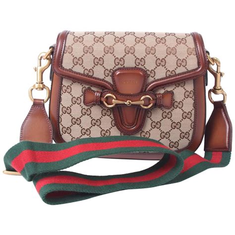 can you buy gucci lady web from outlet|gucci leather handbags.